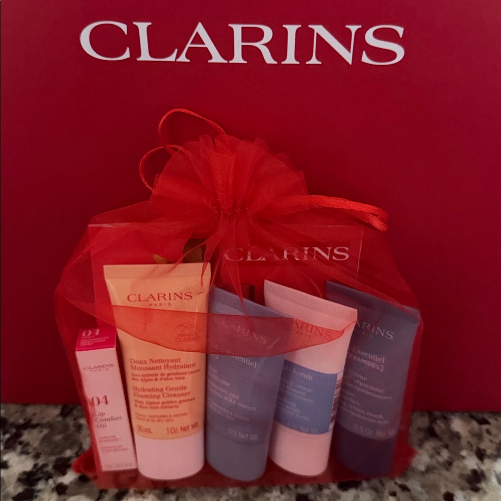 Clarins Skincare Collection in Vibrant Red Bag